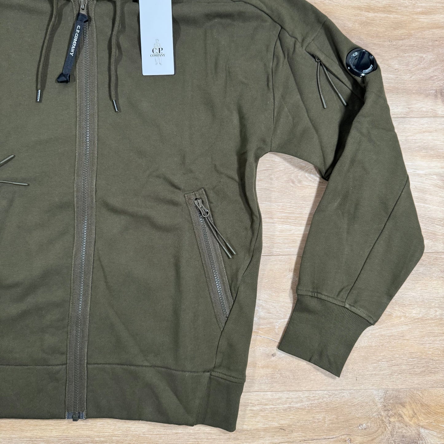 C.P. Company Diagonal Raised Zipped Lens Hoodie in Ivy Green