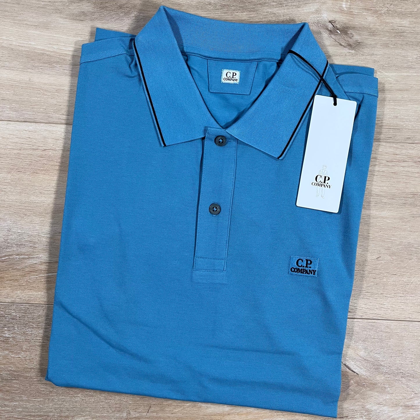 C.P. Company Stretch Piquet Striped Collar Polo Shirt in Aegean Blue