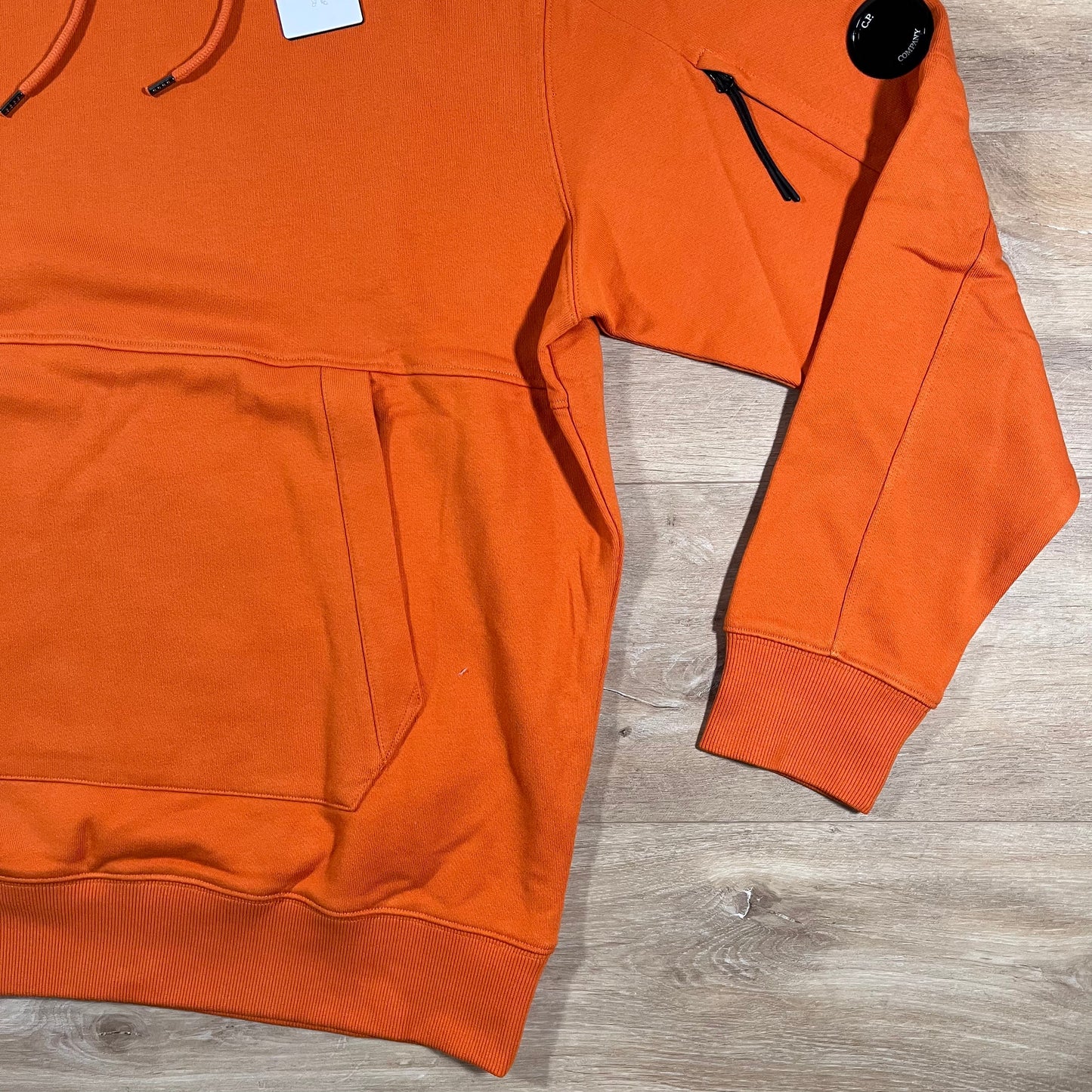 C.P. Company Diagonal Raised Fleece Lens Hoodie in Russet Orange