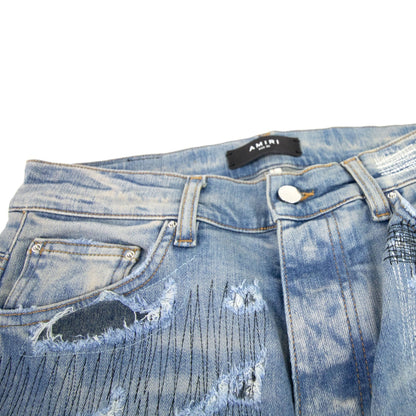Amiri All Over Repair Jean Denim