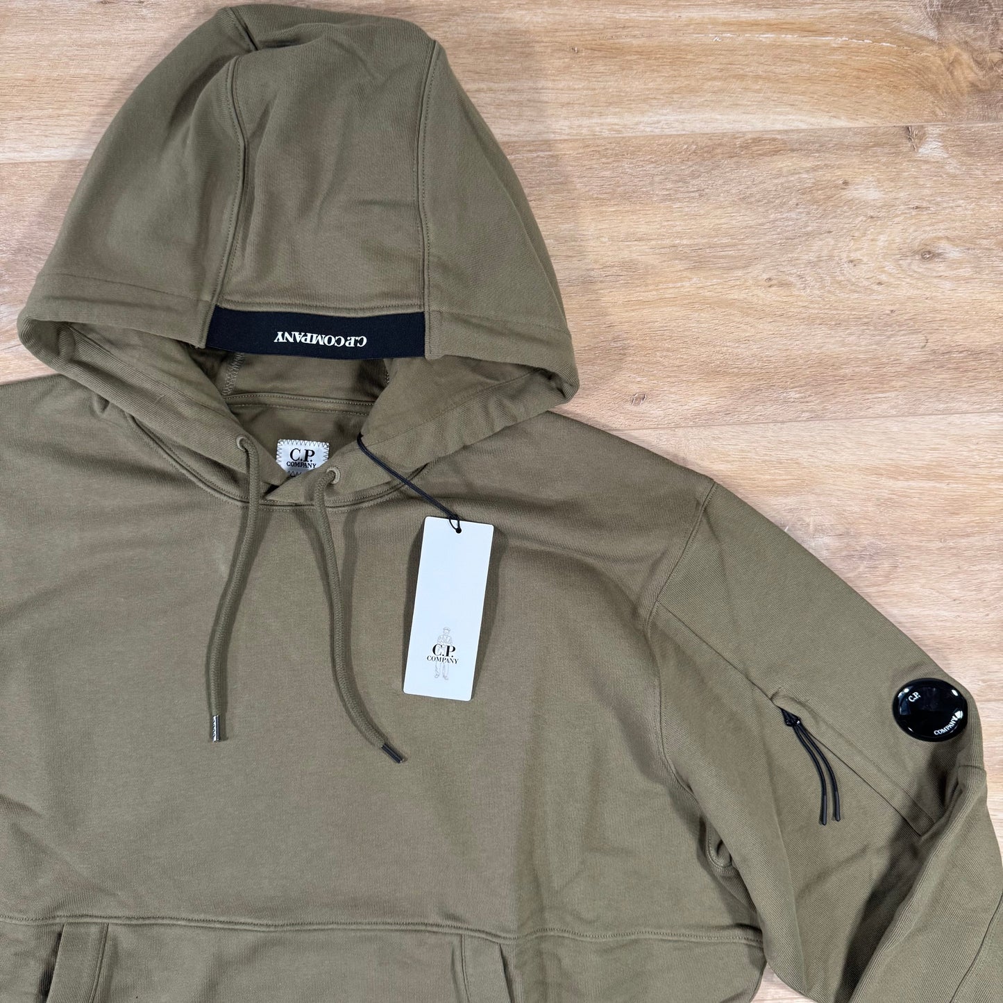 C.P. Company Diagonal Raised Fleece Lens Hoodie in Elmwood Green
