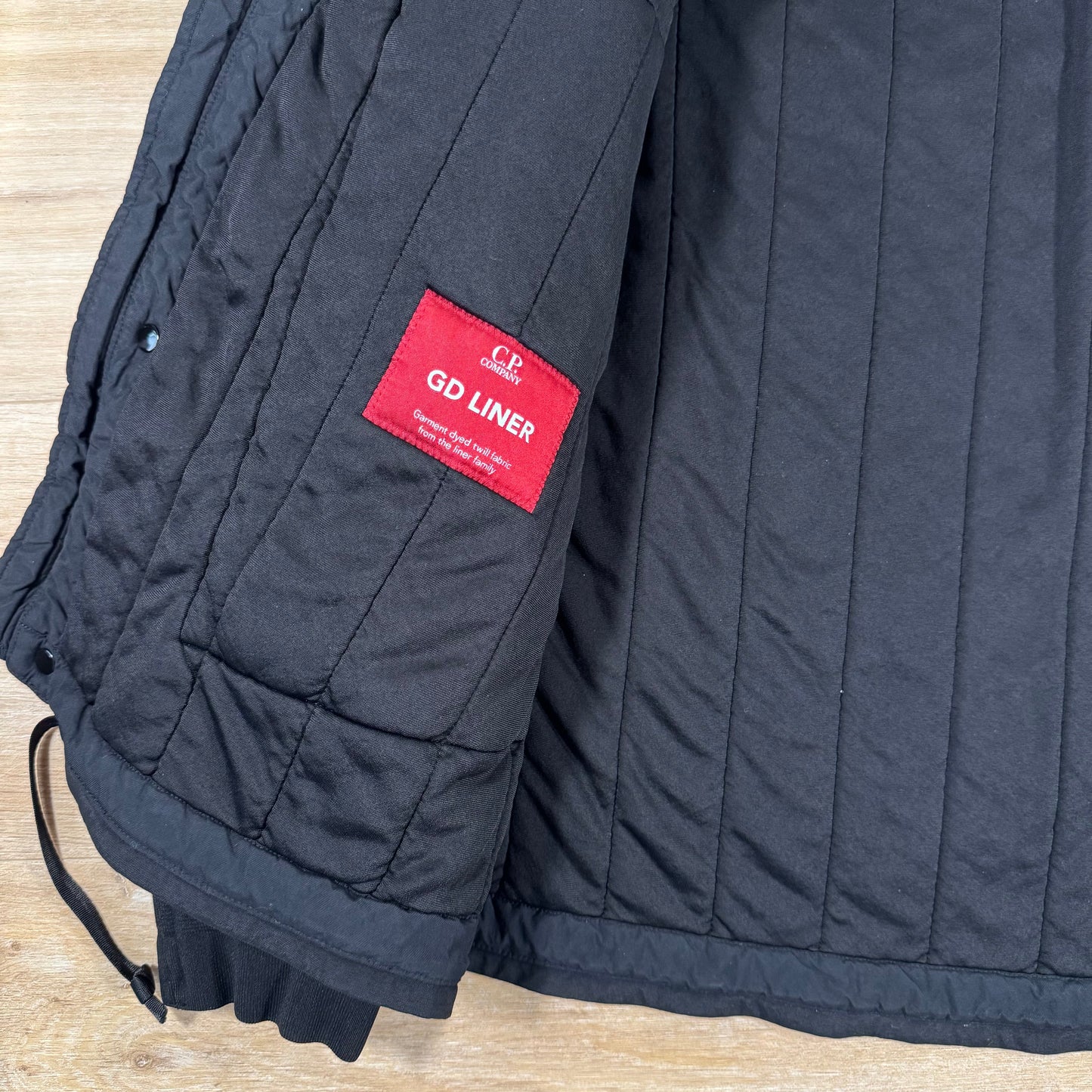 C.P. Company GD Liner Padded Goggle Jacket in Black