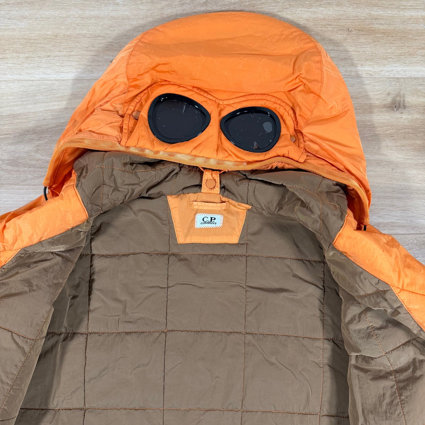 C.P. Company Chrome-R Padded Goggle Jacket in Russet Orange