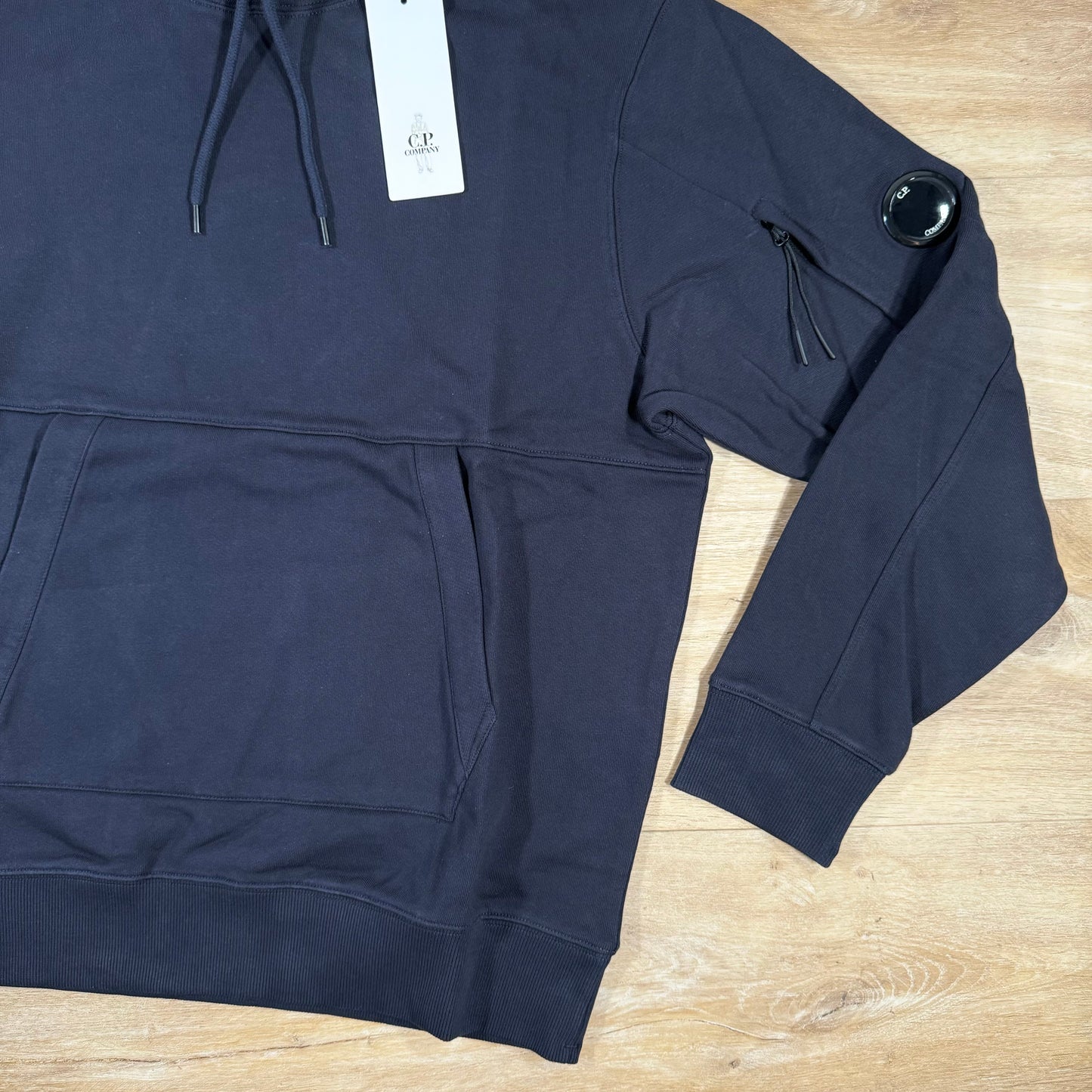 C.P. Company Diagonal Raised Fleece Lens Hoodie in Navy
