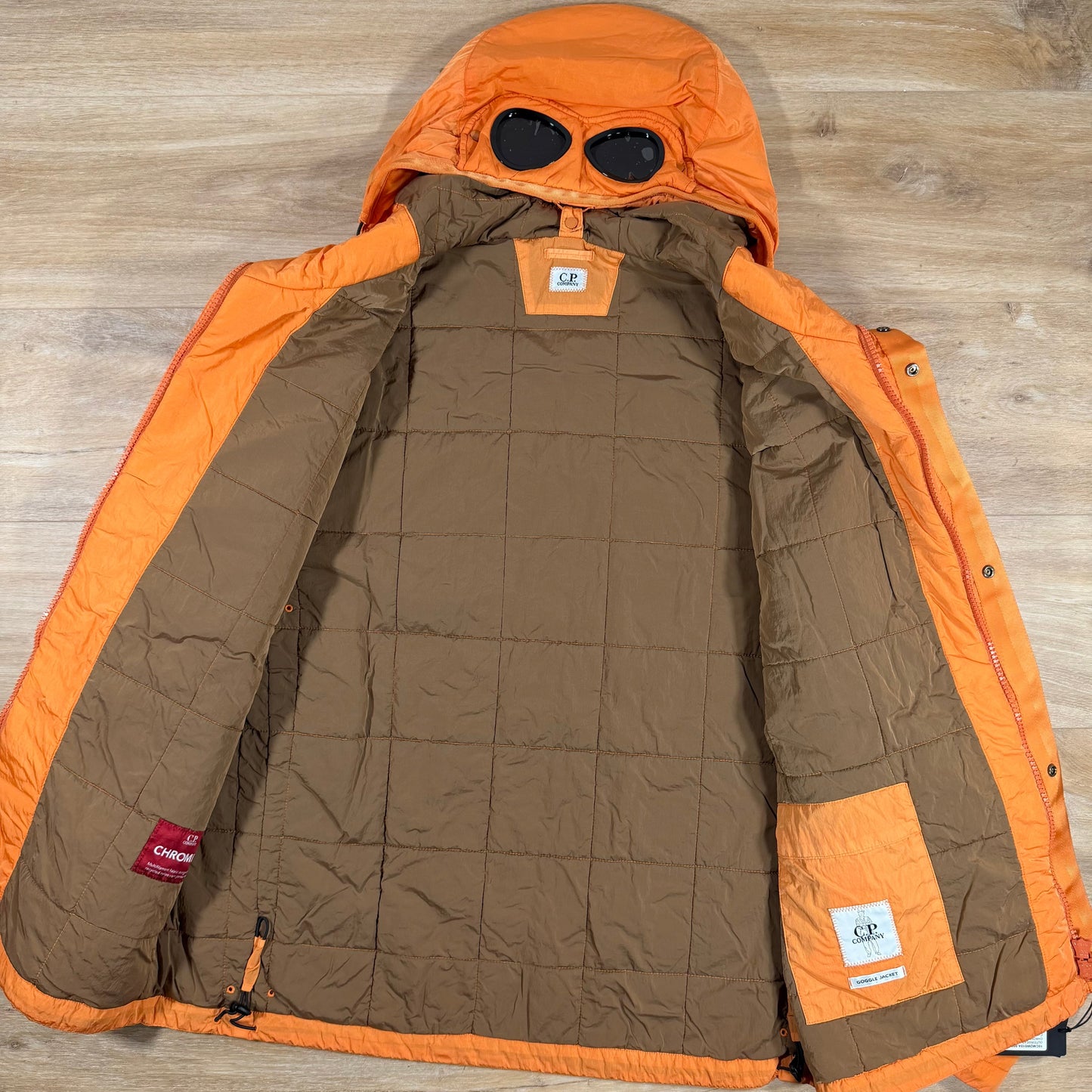 C.P. Company Chrome-R Padded Goggle Jacket in Russet Orange