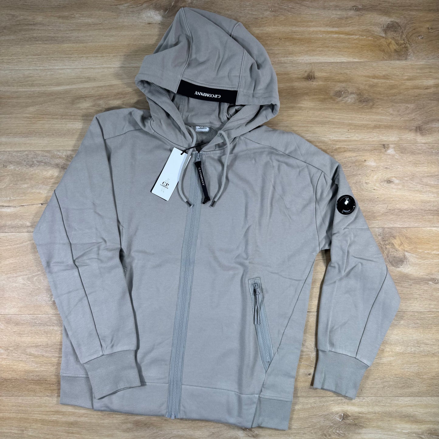 C.P. Company Diagonal Raised Zipped Lens Hoodie in Dove