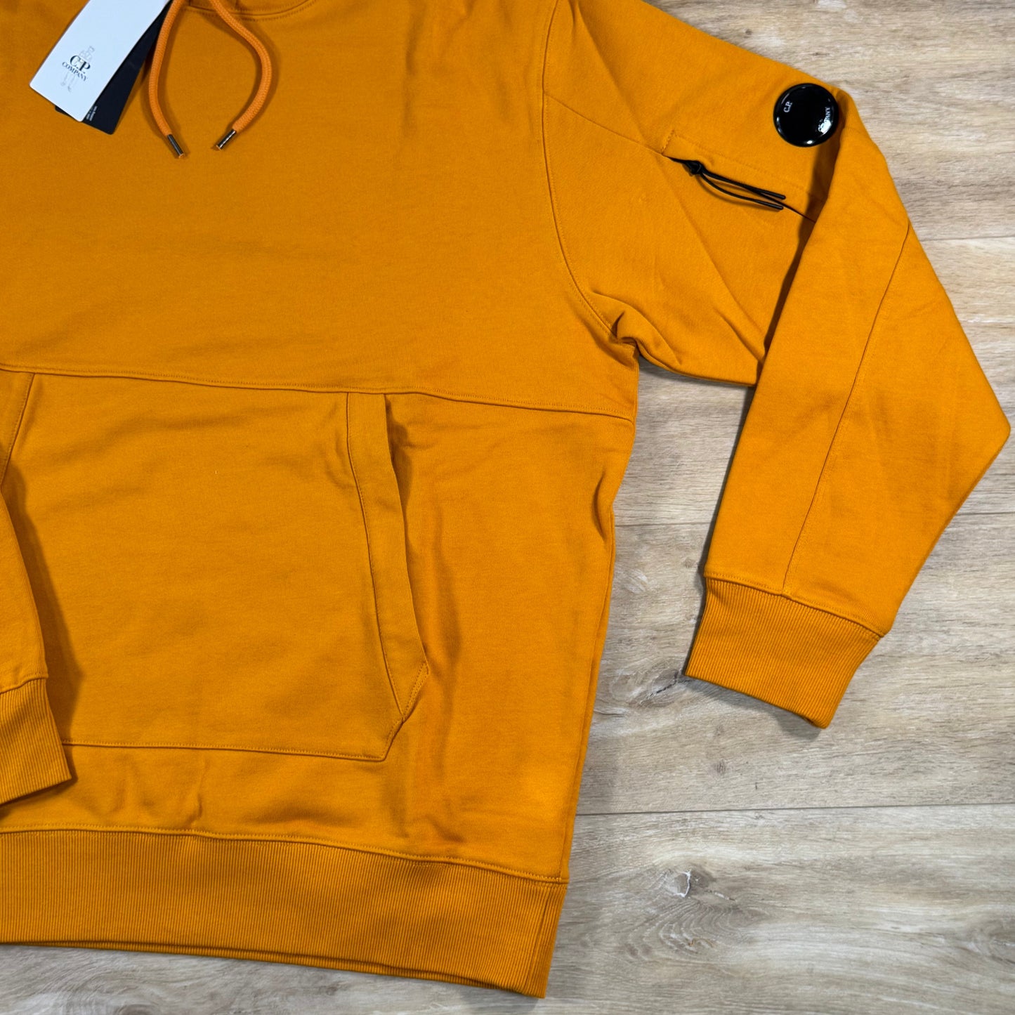 C.P. Company Diagonal Raised Fleece Lens Hoodie in Desert Sun
