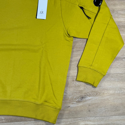 C.P. Company Diagonal Raised Fleece Crewneck Lens Sweatshirt in Antique Moss - Yellow