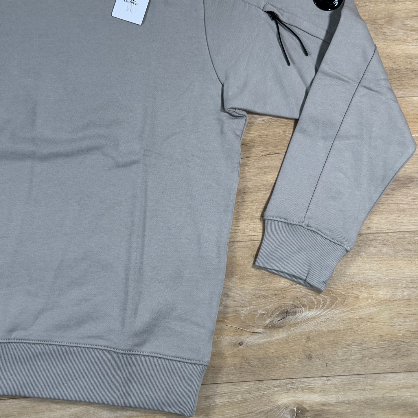 C.P. Company Diagonal Raised Fleece Crewneck Lens Sweatshirt in Dove