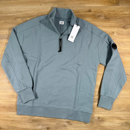 C.P. Company Diagonal Raised Half-Zip Lens Sweatshirt in Silver Blue