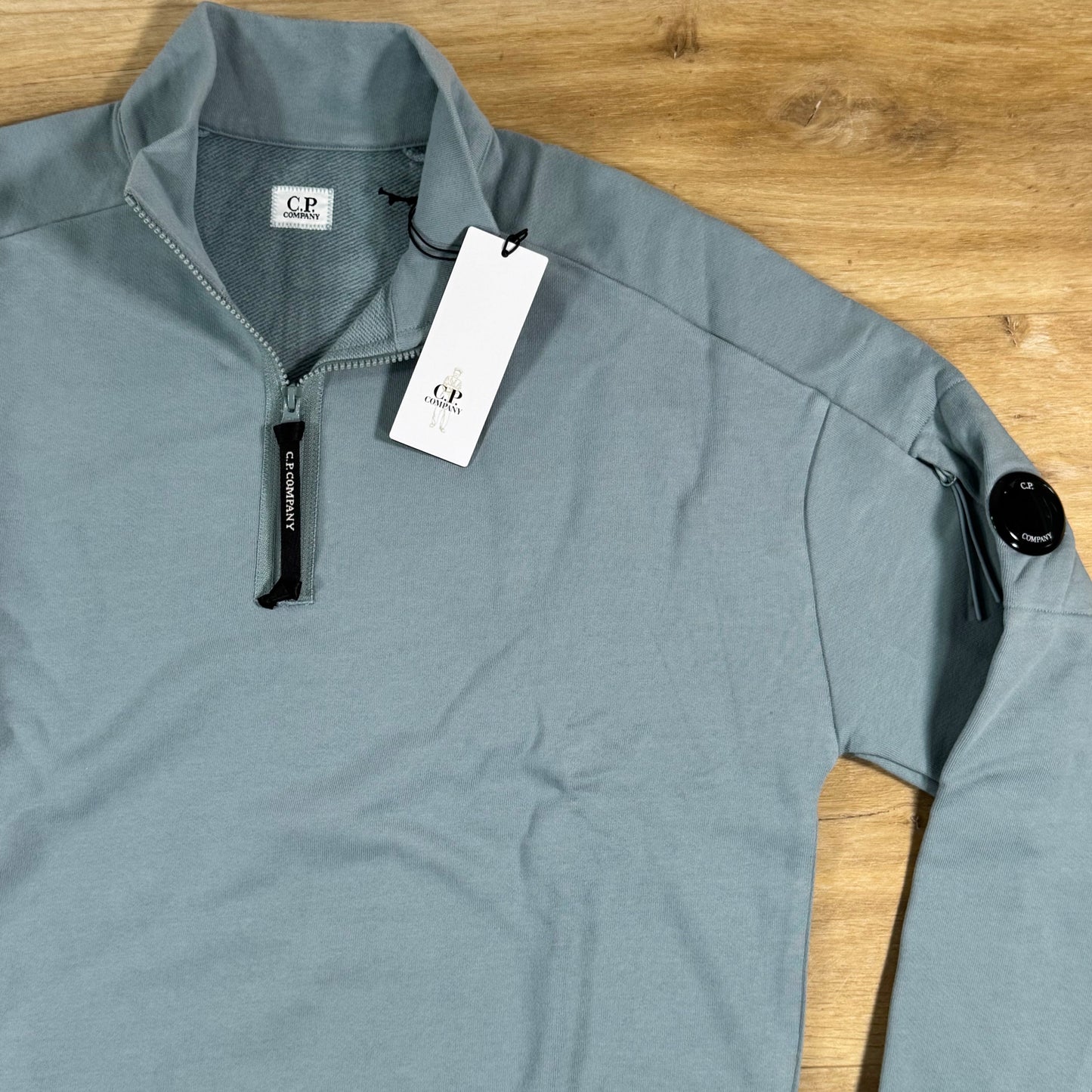 C.P. Company Diagonal Raised Half-Zip Lens Sweatshirt in Silver Blue