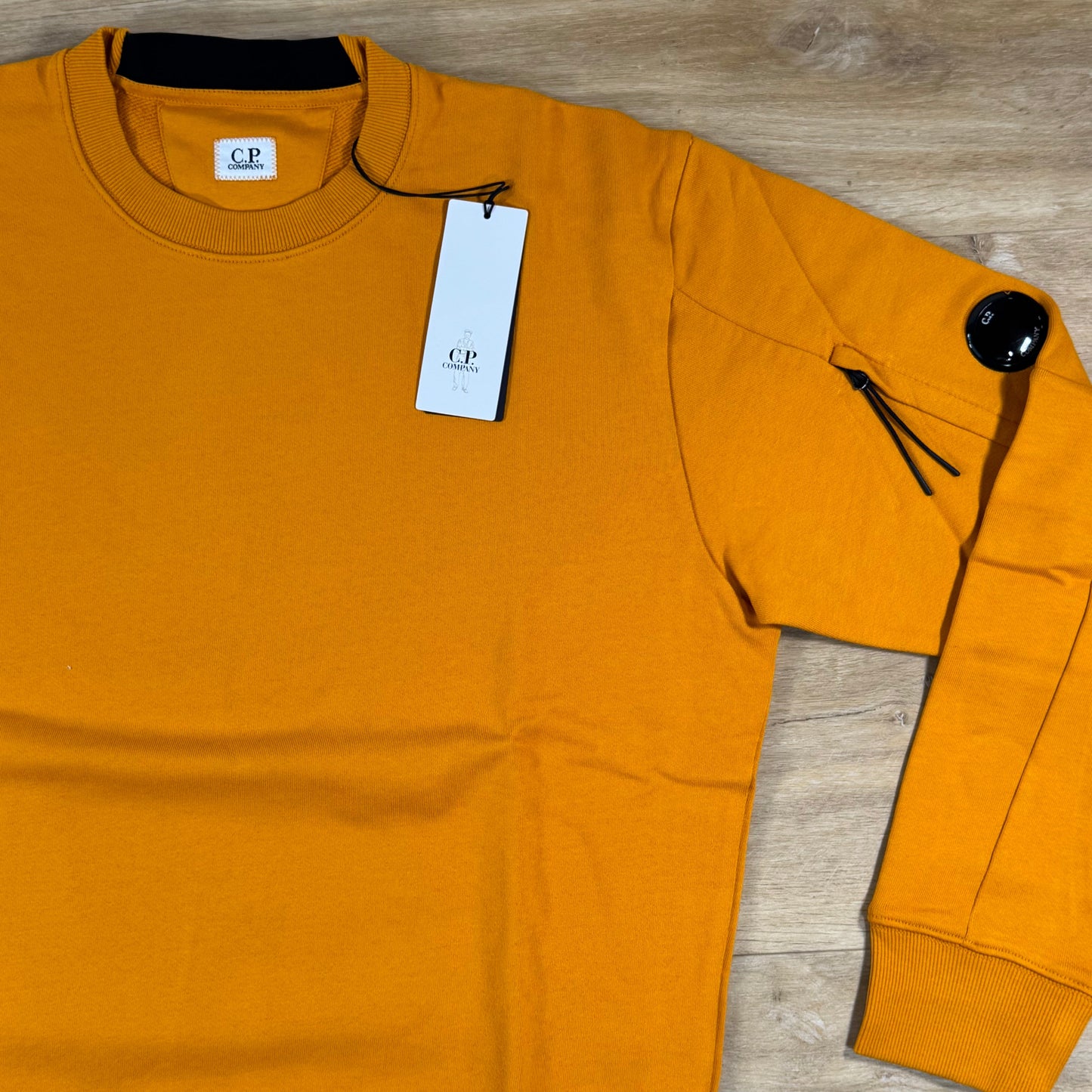 C.P. Company Diagonal Raised Fleece Crewneck Lens Sweatshirt in Desert Sun