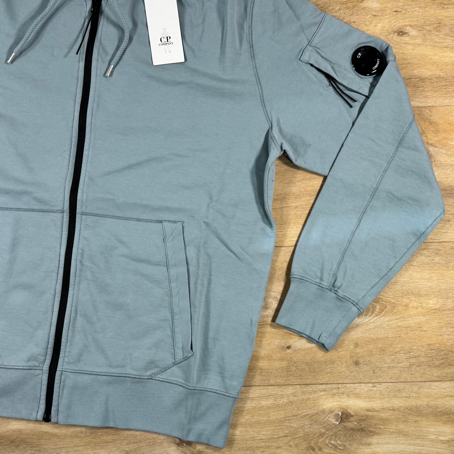 C.P. Company Light Fleece Zip Lens Hoodie in Silver Blue