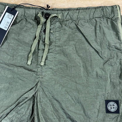 Stone Island Nylon Metal Button Swim Shorts in Military Green