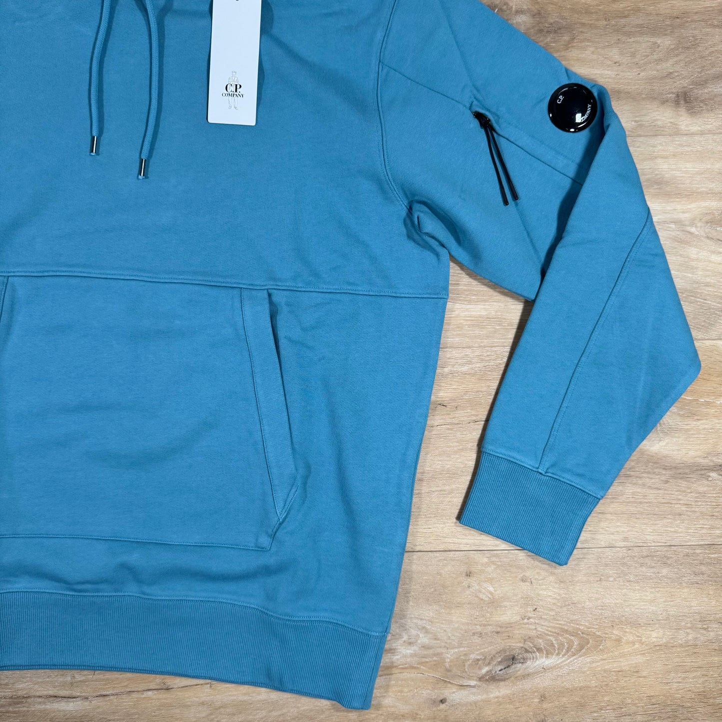 C.P. Company Diagonal Raised Fleece Lens Hoodie in Aegean Blue