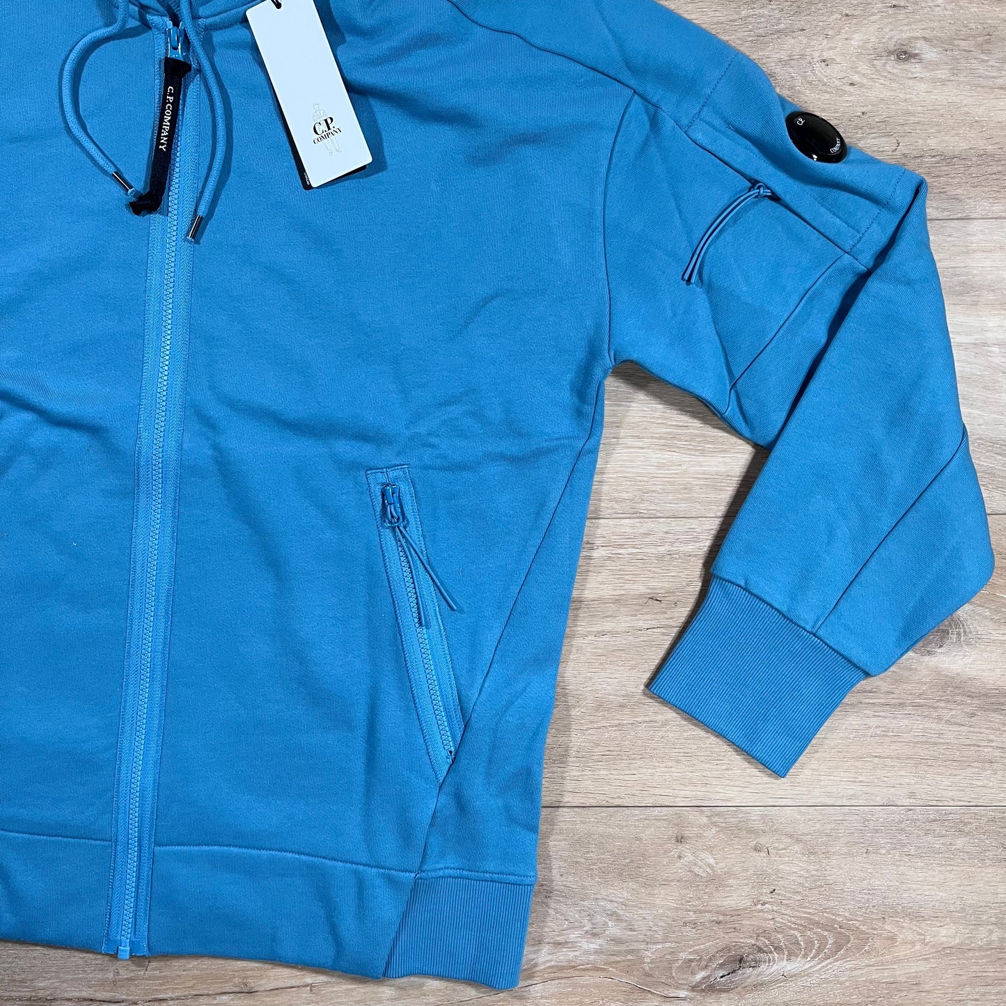 C.P. Company Diagonal Raised Zipped Lens Hoodie in Aegean Blue